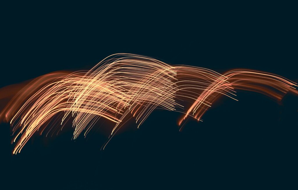 a blurry photo of a long exposure of fireworks