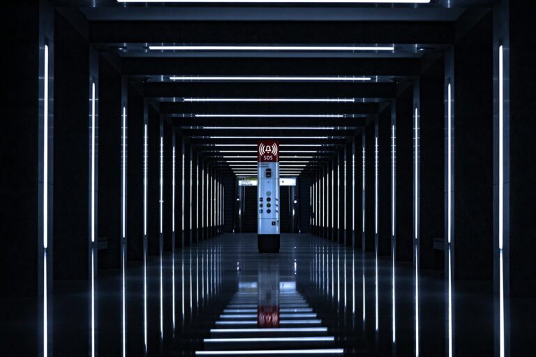 a long hallway with a clock on the wall