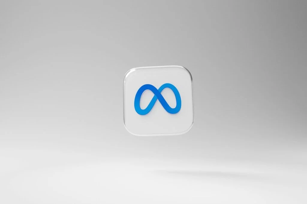 a white square with a blue logo on it